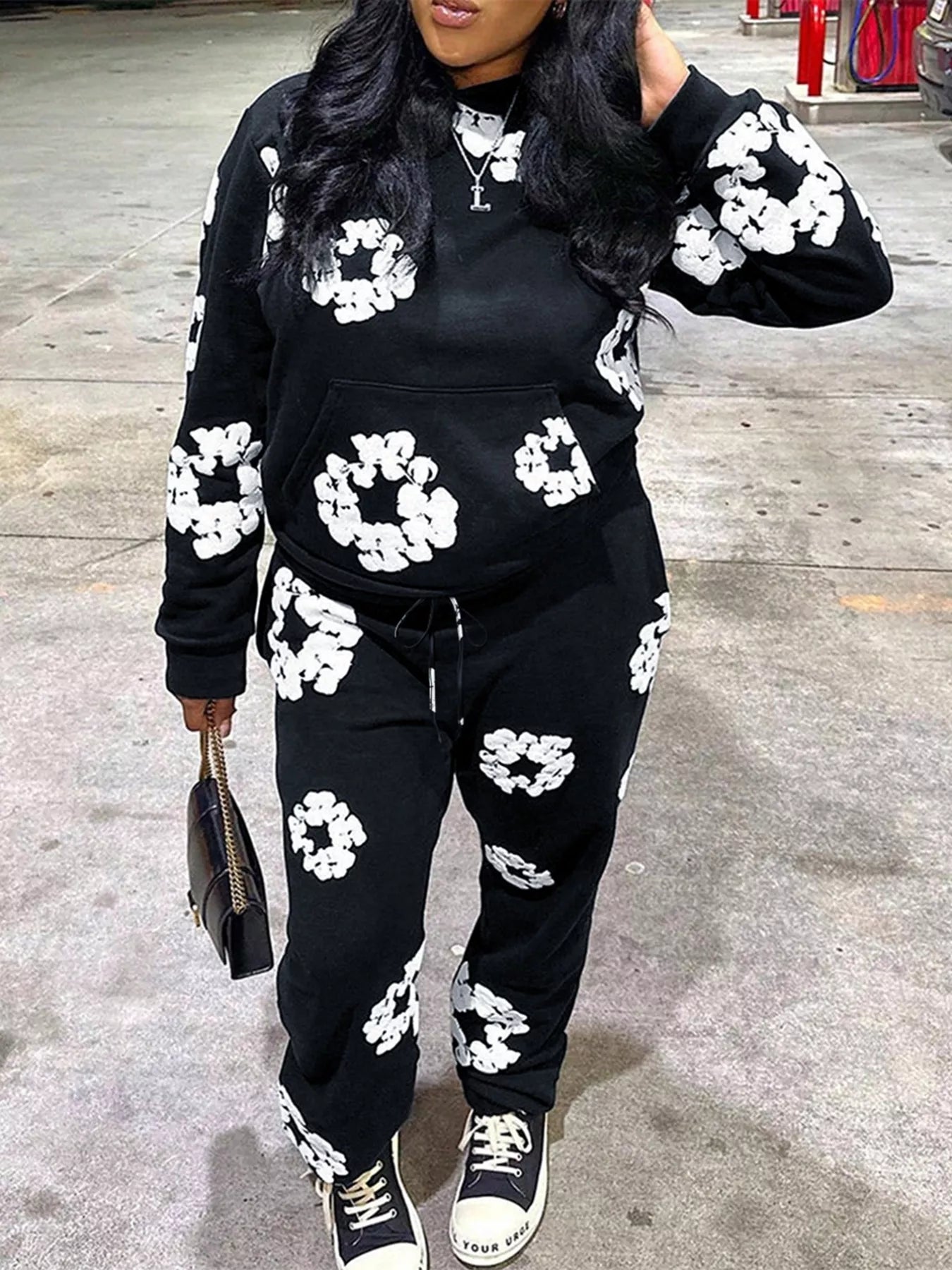 Black sweatsuit with denim tears design (white flowers)