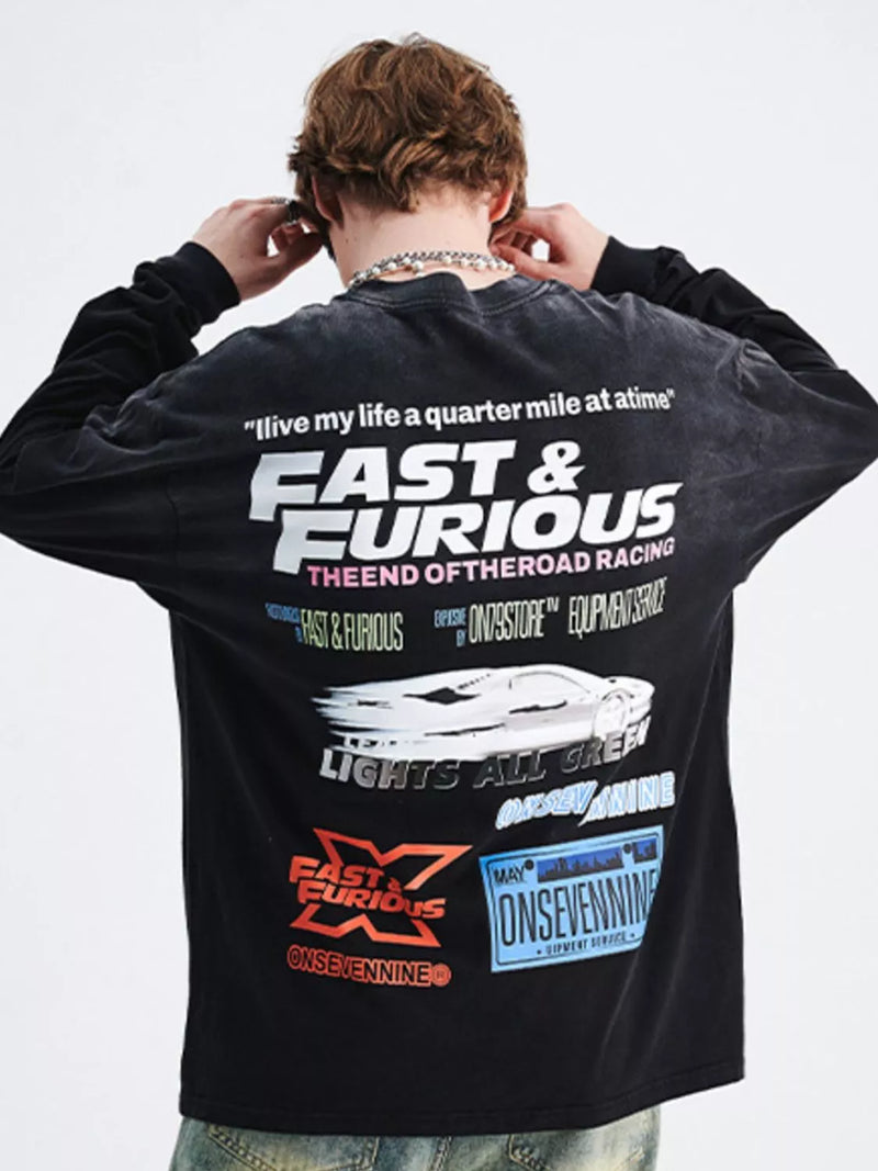 Person wearing a black long sleeved shirt with 'Fast & Furious' branding on the back.