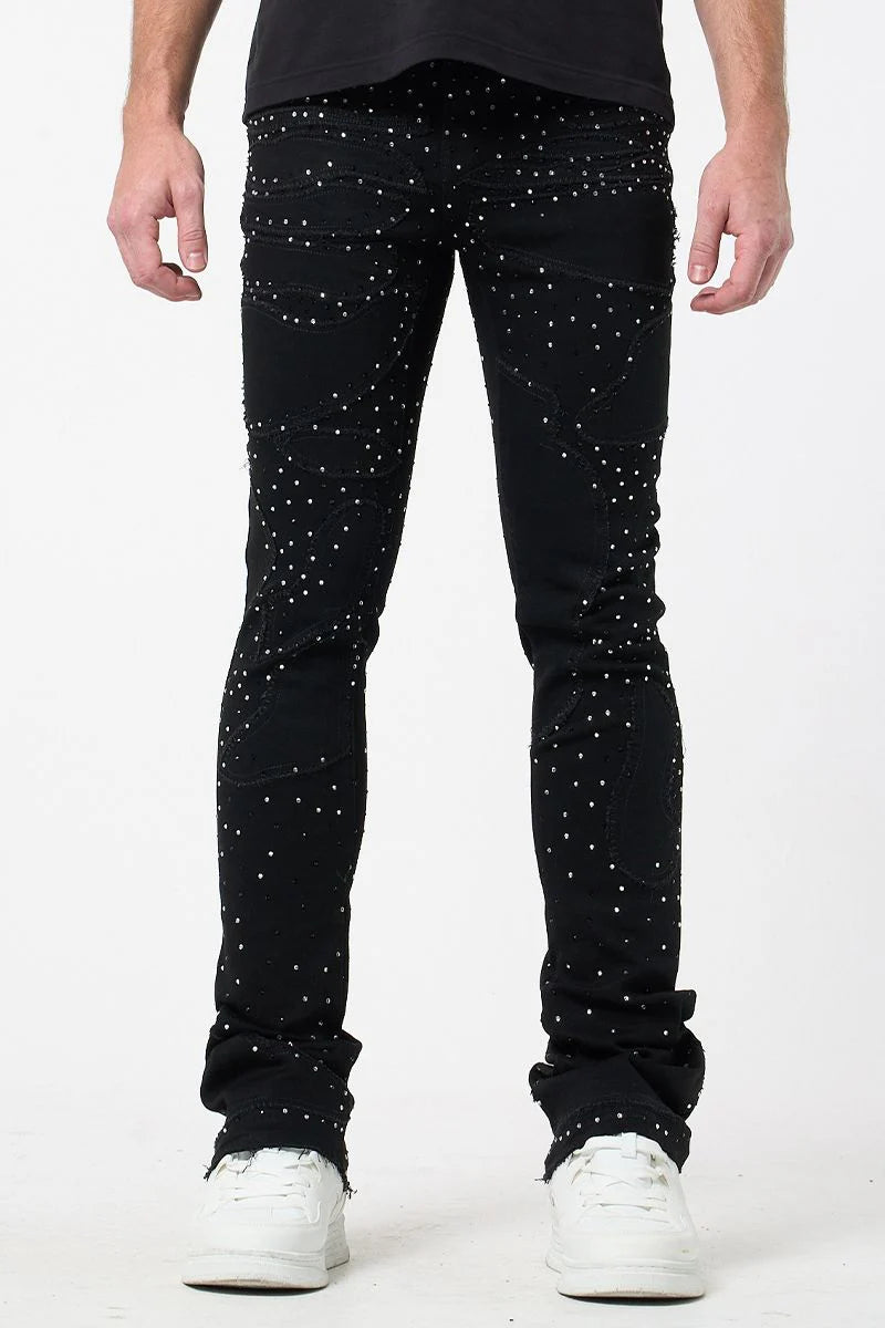 Man wearing Black jeans with white embellishments 